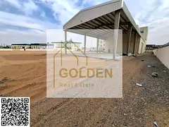 Prime Rental Opportunity in New Umm Al Quwain Industrial Area – 50,000 sq.ft Land with Two Warehou