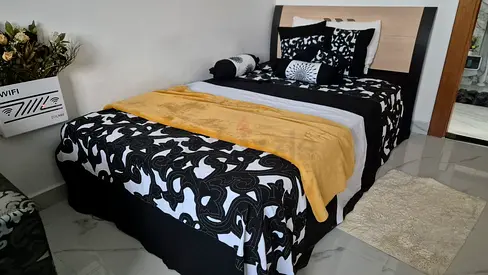 Elegant modern dark and light wood bedframe and mattress twin size