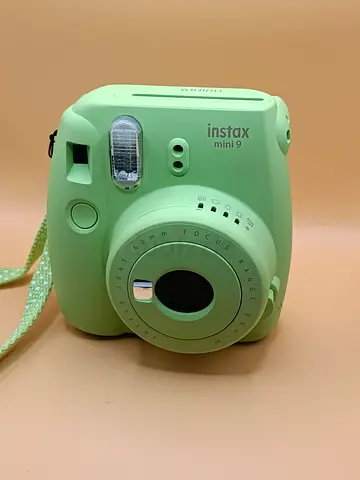 Fujifilm Instax Mini 9 instant camera in Lime Green.