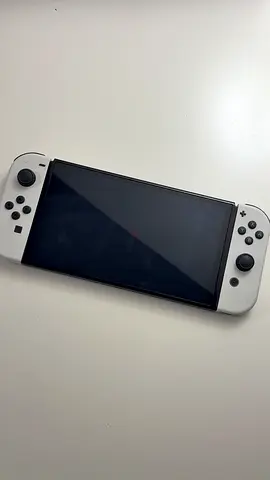 Nintendo Switch OLED (White Joy-Cons) – Like New