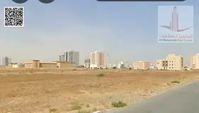 Two plots of land for sale in Ajman, Al Muwaihat 2, Sheikh Ammar Street, residential villas (G+1+ROO