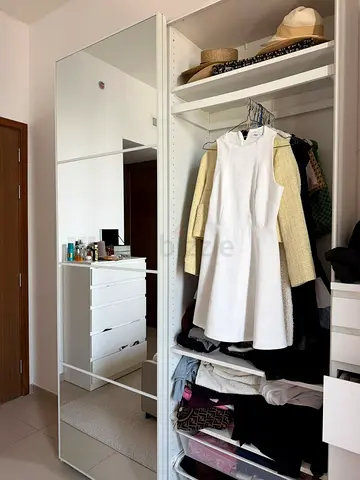 Stylish Wardrobe with Mirror and Ample Storage
