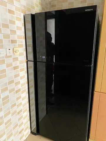 Hitachi 710 liter black glass door refrigerator neat and clean