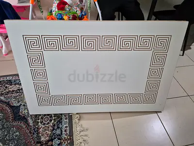 Stylish White Coffee Table with Unique Greek Key Design