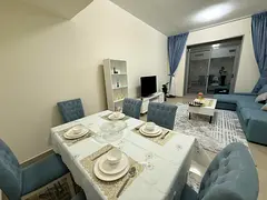 Furnished 2-bedroom apartment with a living room for monthly rent on Ajman Corniche