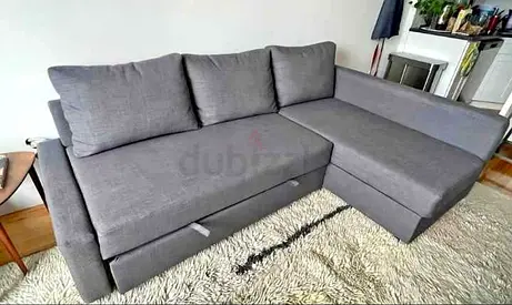 Ikea L Shape Sofa cum bed with big storage in L
