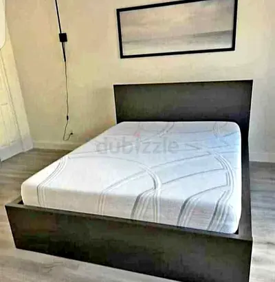 IKEA malam king‑size bed (180 × 200 cm) with 2 storage drawers underneath and an IKEA mattress
