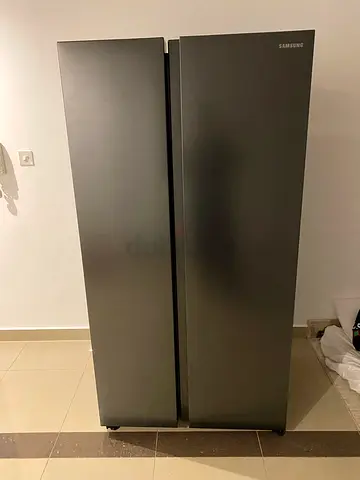Samsung side by side refrigerator neat and clean