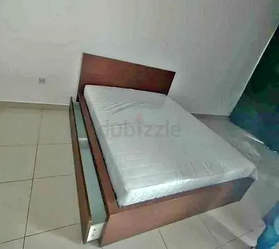 IKEA malam queen‑size bed (160 × 200 cm) with 2 storage drawers underneath and an IKEA mattress