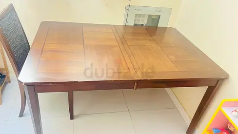Expandable table with 4 chair and folding bed