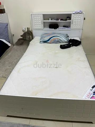 Well-Loved Bed Frame with Shelving and with mattress