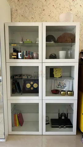 2 Stylish Modern Glass Display Cabinets from ikea in excellent condition