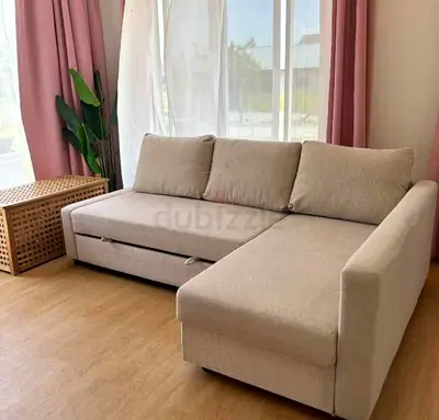 Ikea L Shape Sofa cum bed with big storage in L