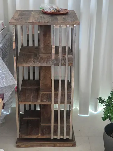 Marina Home Rollins revolving book shelf, made from Oak wood and metal