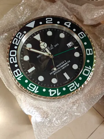Wall clock Rolex