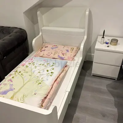 Cute White Toddler Bed with Floral Bedding