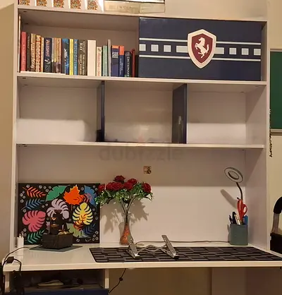 Study table with bookshelves and drawers.