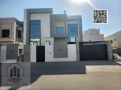 Villa for sale in Al Amrah area, Ajman. Modern design, ground and first floors (5 master bedrooms, m