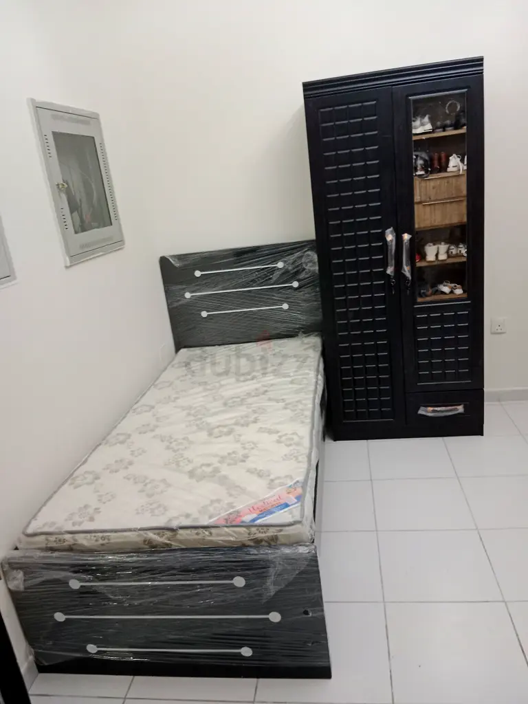 bed and cabinet