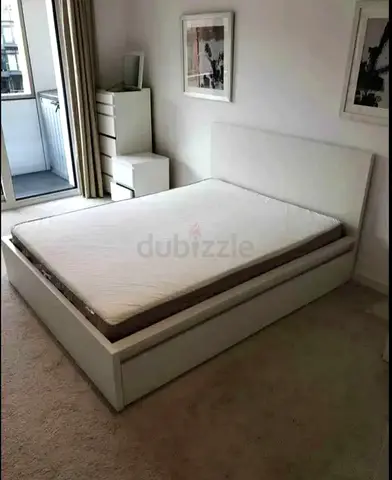 IKEA malam double‑size bed (140 × 200 cm) with 2 storage drawers underneath and an IKEA mattress