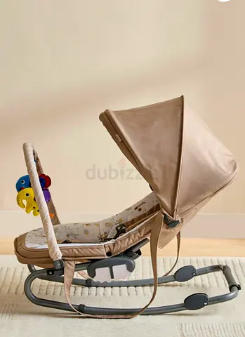 Baby rocker with toy bar