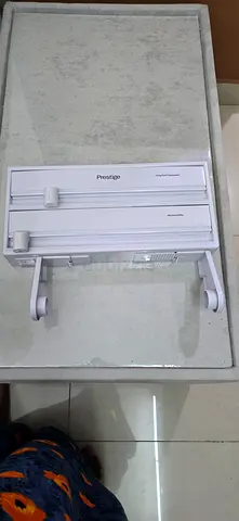 Prestige paper towel.cling wrap and foil dispenser all in one