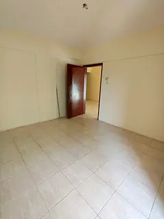 One bedroom and living room with a balcony