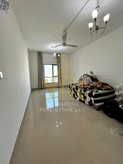 Luxury ready-to-move-in studio for sale in Al Naeema Tower C, open view of Al Hikma School &amp; Bla