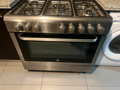 Hoover 5 hubs gas with electric oven size 90 by 60cm
