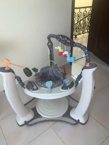 Evenflo ExerSaucer stationary Jumper with Toys - blue /grey