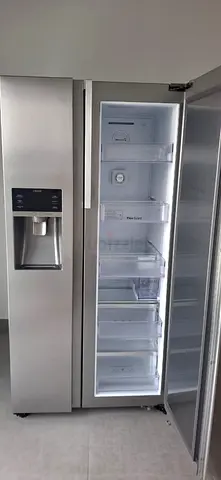 Samsung latest model side by side fridge with water depanser and ice maker door in door