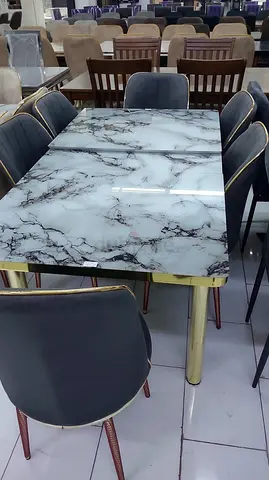 Brand new dining table with 6 chairs for sell