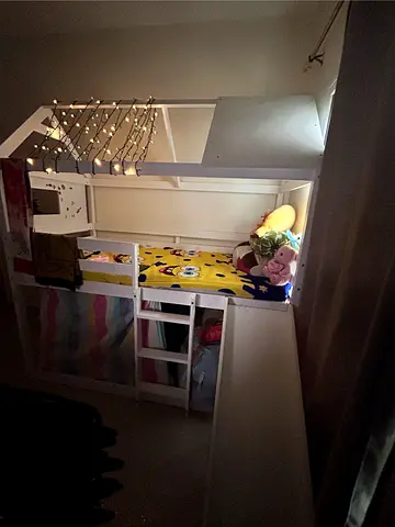 Bed with slide