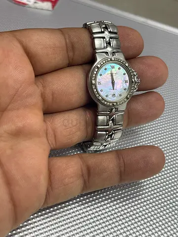 Elegant Womens Raymond Weil Silver Watch with Mother of Pearl Dial