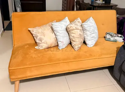 Chic Orange Velvet Sofa with Cushions