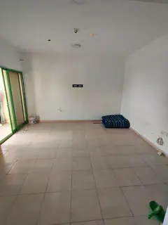 For annual rent in Sharjah, specifically in the Al Rolla area: two bedrooms, a living room, one bath