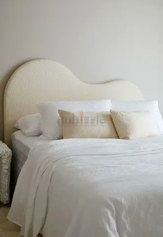 Elegant Bed with Soft Curved Headboard