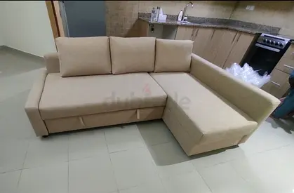 Ikea L Shape Sofa cum bed with big storage in L