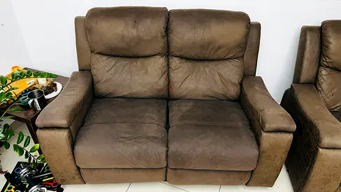 Comfortable brown two-seater recliner sofa