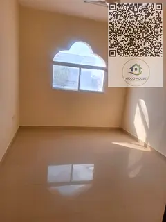 For annual rent in Al Rawda 3, a spacious 1-bedroom apartment with living room,