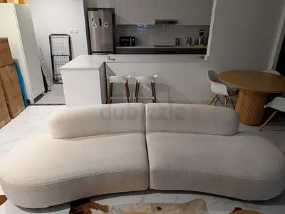 Stylish Curvy Cream Sofa for Modern Living Room