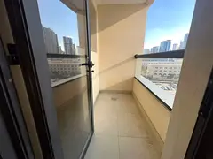 Two master bedrooms apartment with balcony and parking in Al Khan Al Qasba, sea view, modern buildin