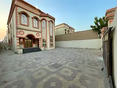A villa in Ajman, Al Mowaihat 2 area, on an asphalt street, and a very large setback space in front