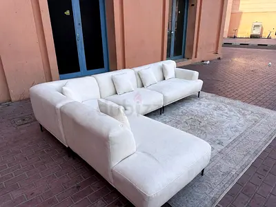 Excellent condition Stylish L shaped Couch with elegant white Sofa