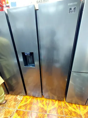 Samsung latest model side by side fridge with water depanser and ice maker