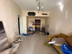 One-bedroom apartment with living room in Al Khan, Sharjah. Prime location near shops, schools, heal