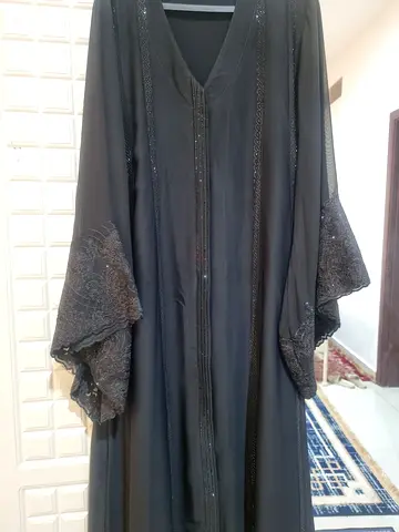 Beautiful black embroidered abaya with bubble sleeves. Elegant, modest