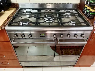 Smeg top gas dual oven electric stove 90cm