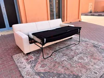 Almost brand new Condition CrateBarrel 3_ Seater Sofa Bed Beige