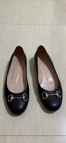Elegant Black Flats with Gold Accents